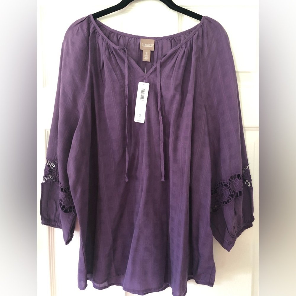 Chico’s tunic with eyelet sleeves